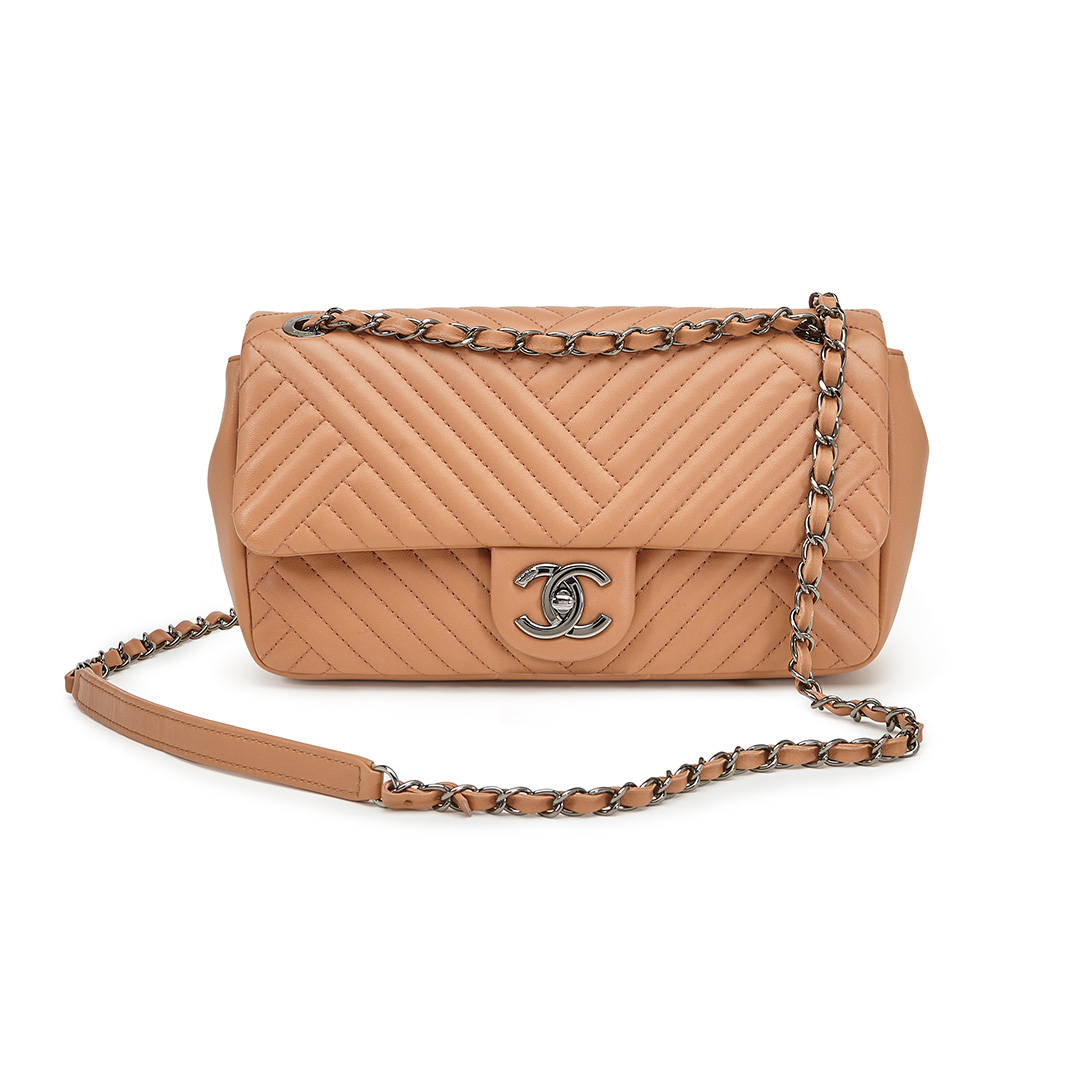 Chanel's Timeless Nude Bag available on www.iconicitems.paris